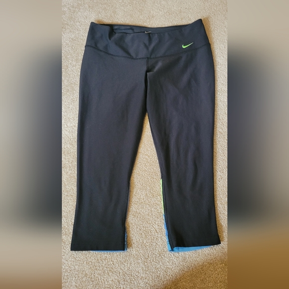 Nike dri-fit womens medium capris black with neon green & blue sheer on back of - Picture 1 of 12